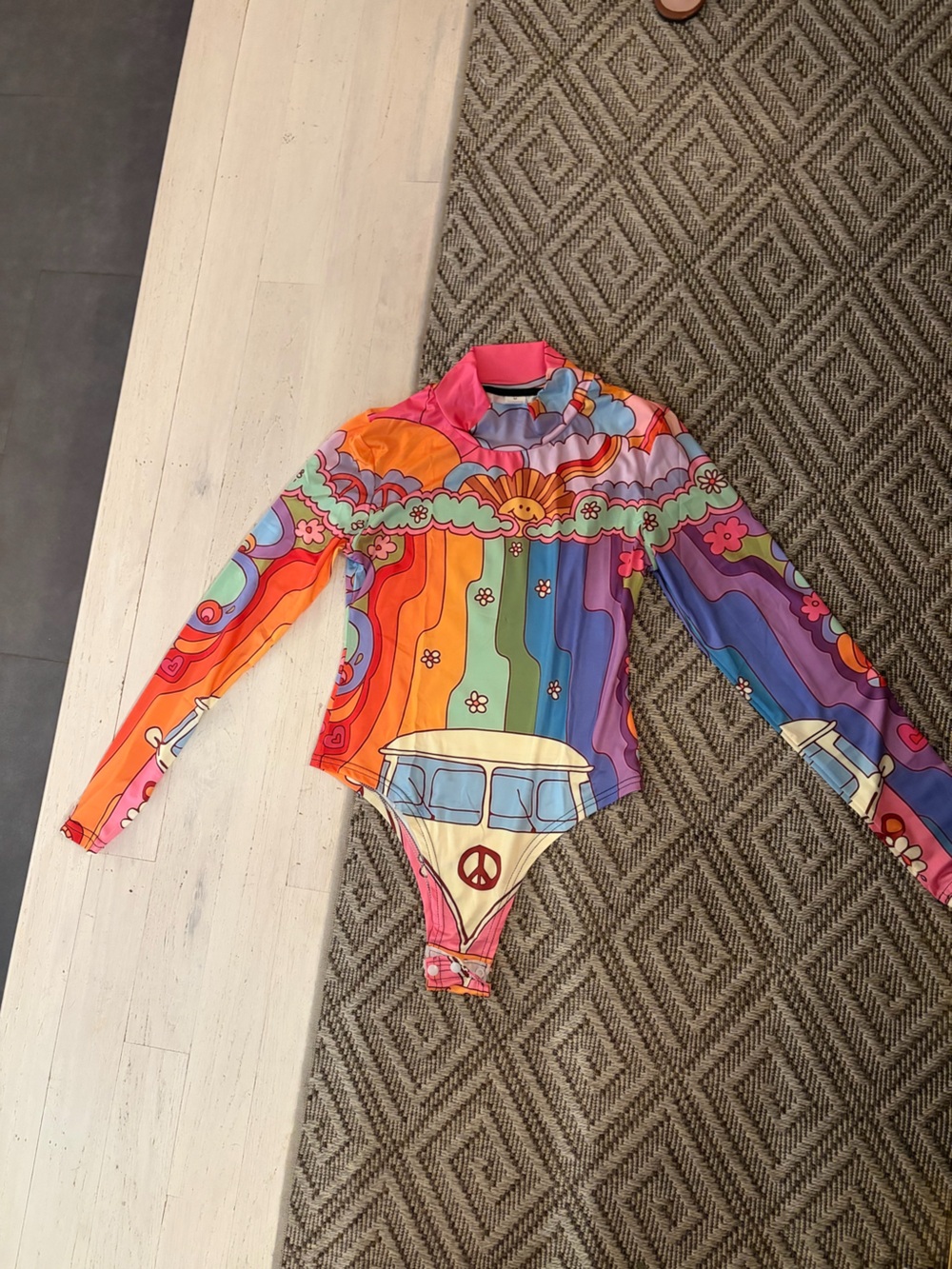 Ladies Long Sleeve One-Piece bodysuit in Multicolor Peace Van Print